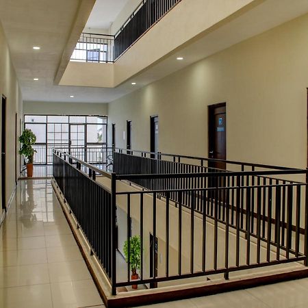 Oyo 90162 Remboelan Guest House Sungai Lutus Ngoại thất bức ảnh