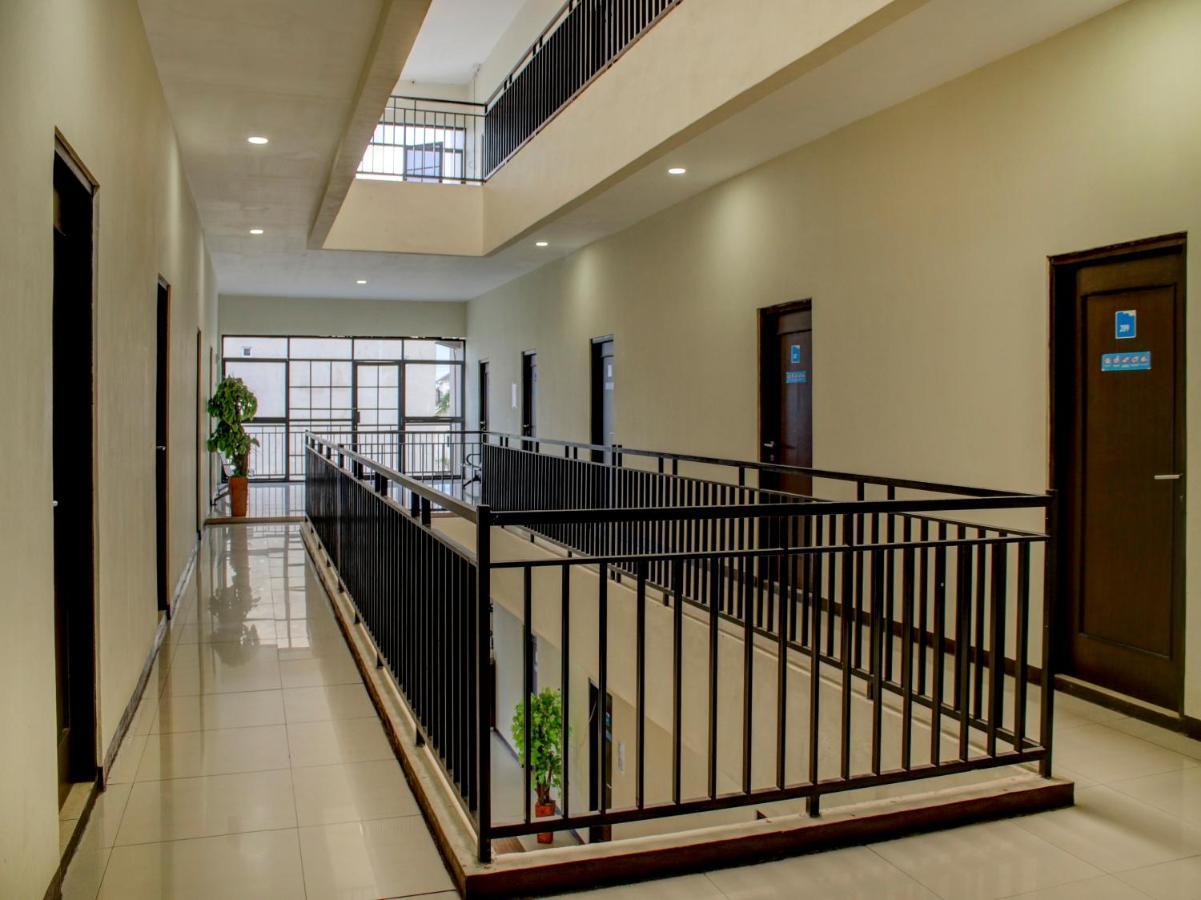 Oyo 90162 Remboelan Guest House Sungai Lutus Ngoại thất bức ảnh