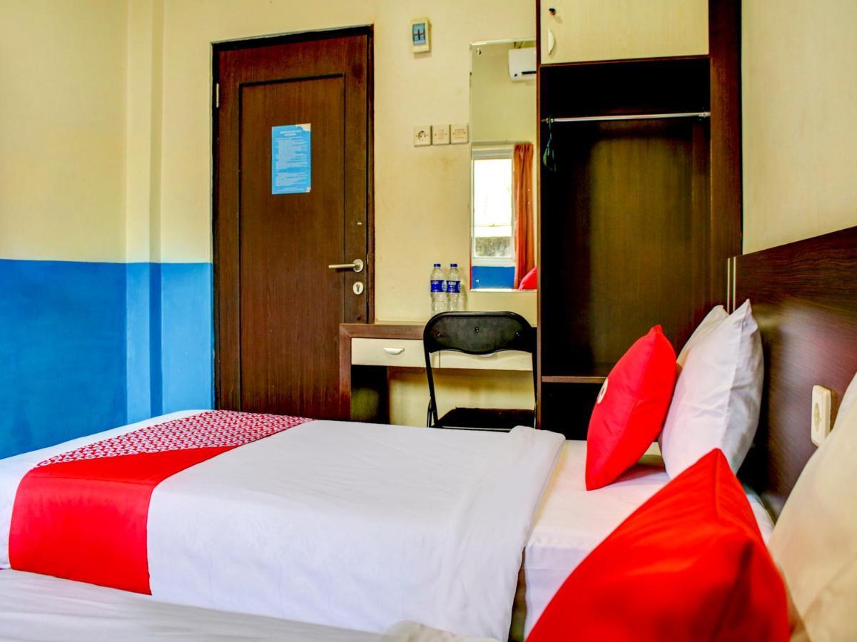 Oyo 90162 Remboelan Guest House Sungai Lutus Ngoại thất bức ảnh