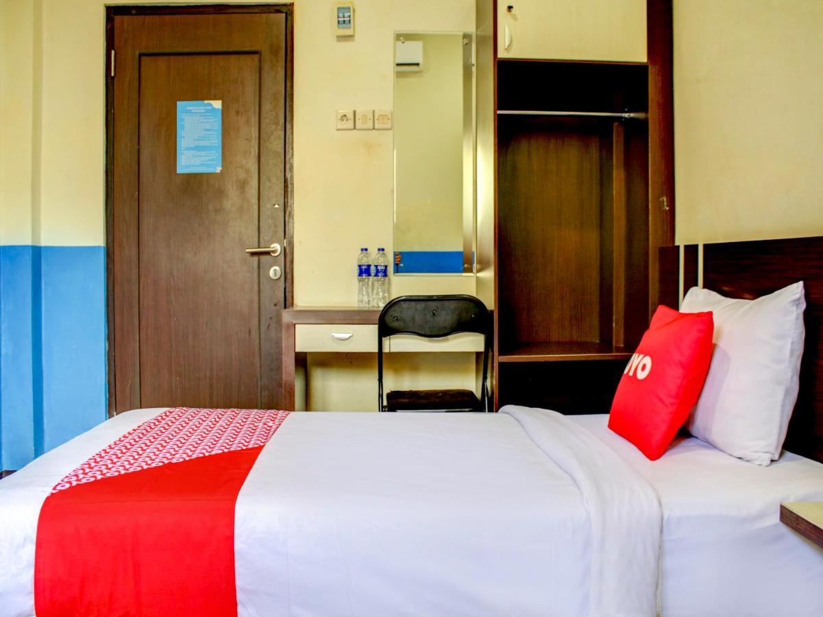 Oyo 90162 Remboelan Guest House Sungai Lutus Ngoại thất bức ảnh