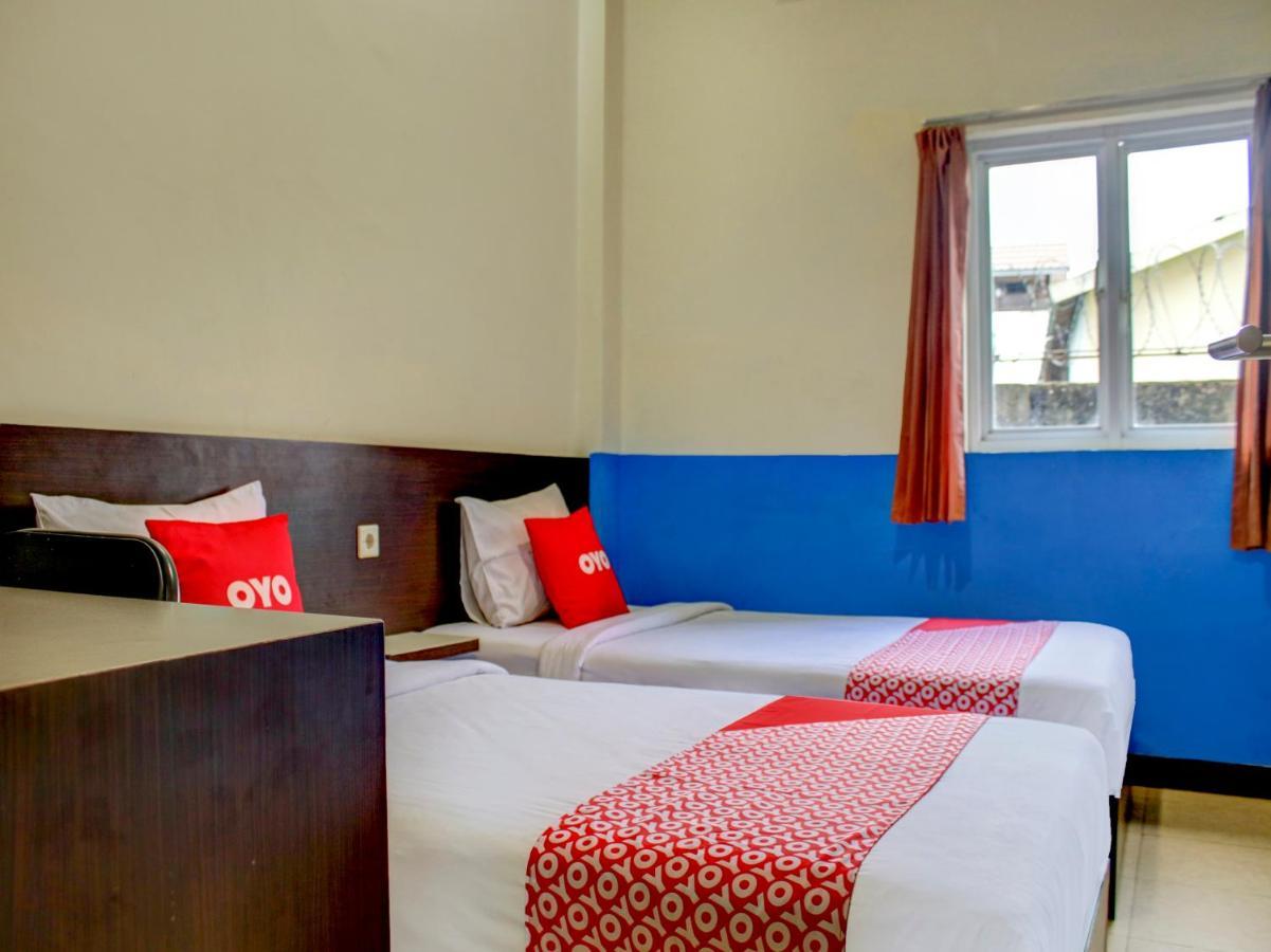 Oyo 90162 Remboelan Guest House Sungai Lutus Ngoại thất bức ảnh