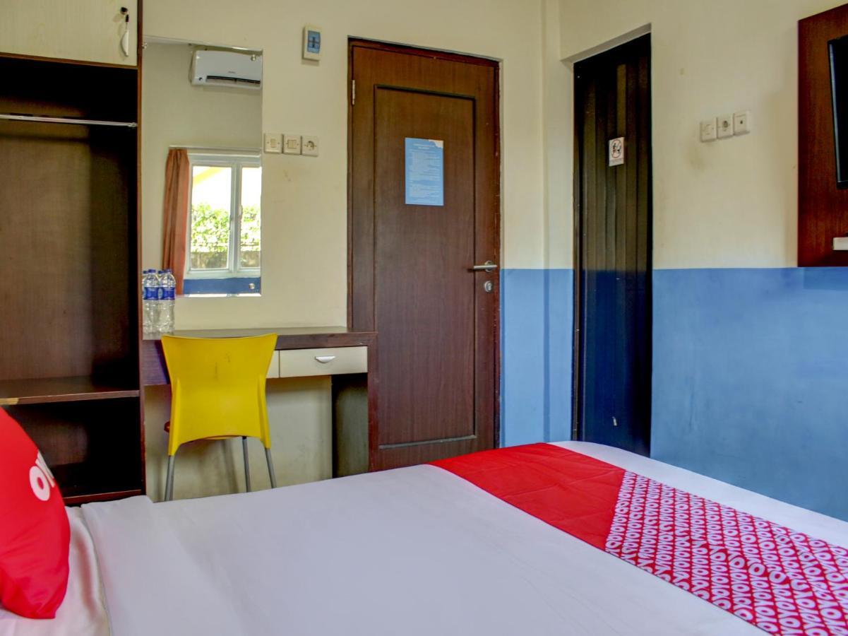Oyo 90162 Remboelan Guest House Sungai Lutus Ngoại thất bức ảnh