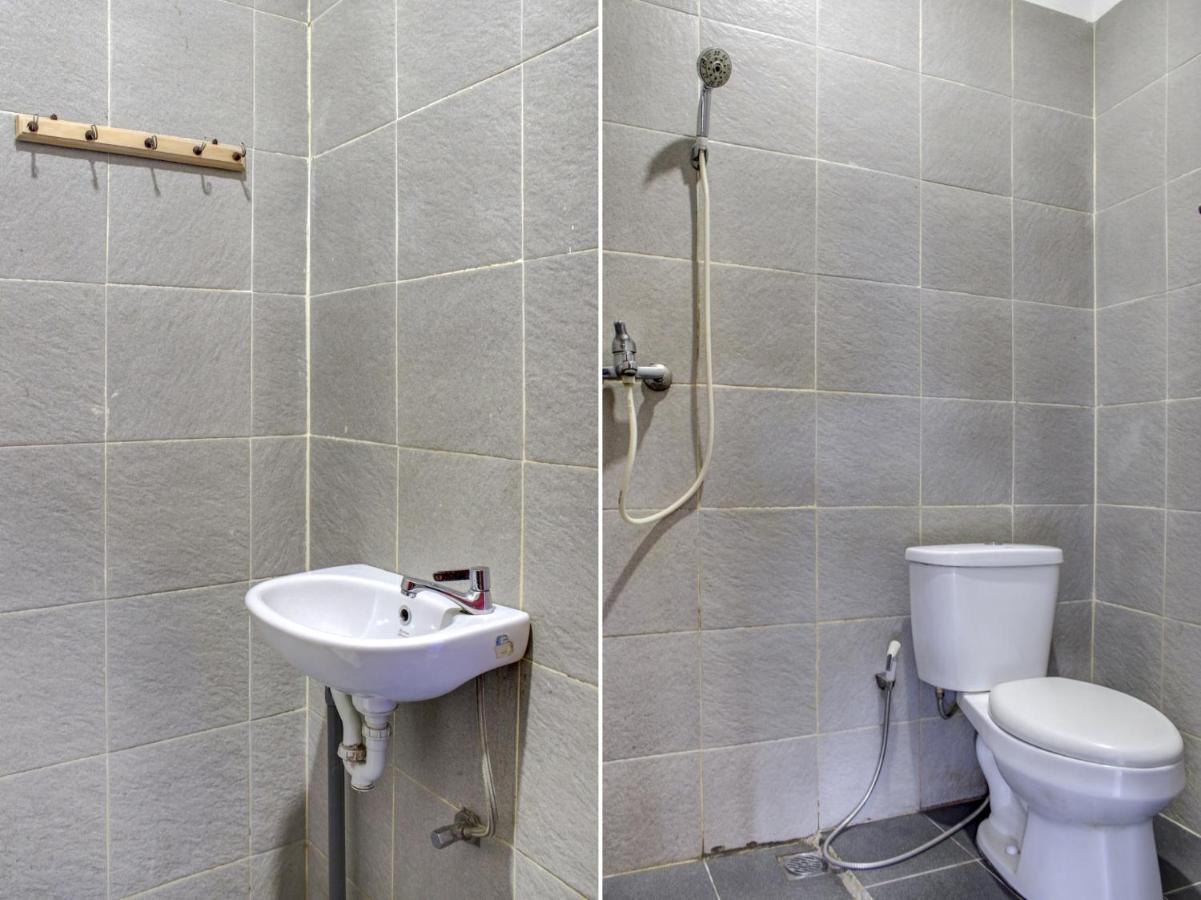 Oyo 90162 Remboelan Guest House Sungai Lutus Ngoại thất bức ảnh
