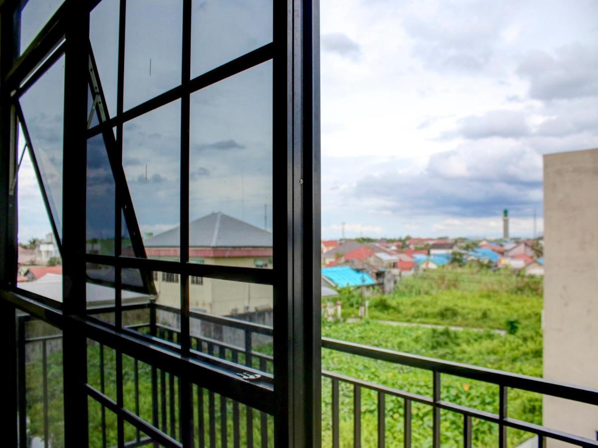 Oyo 90162 Remboelan Guest House Sungai Lutus Ngoại thất bức ảnh
